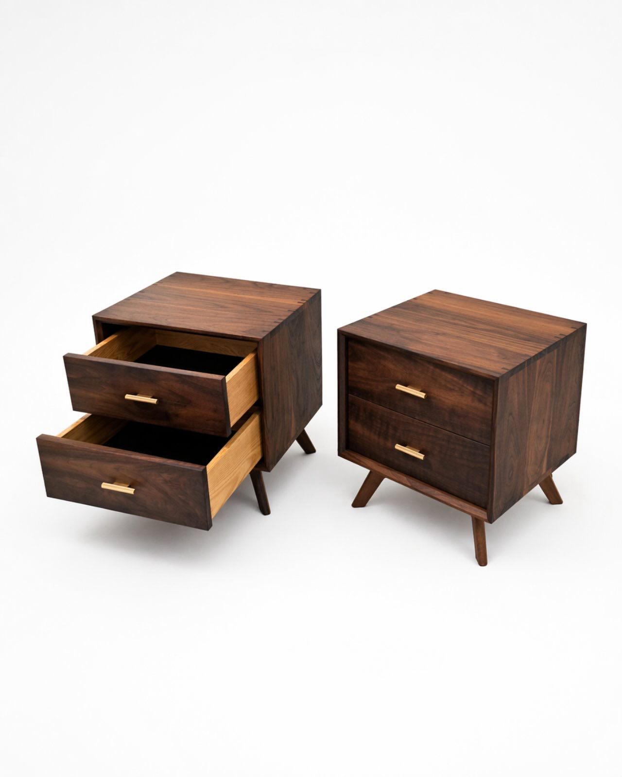 The pair seen from above at an angle, the left nightstand with both drawers pulled out to show pale drawer sides